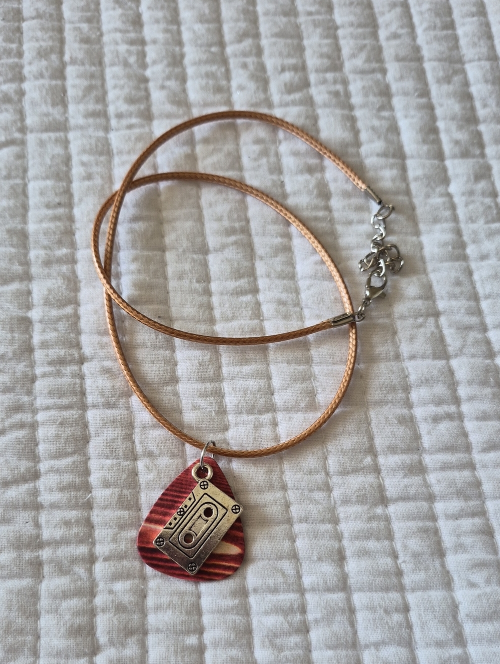 Tan Cord Necklace with Wood Grain Guitar Pick and Silver Cassette Charm